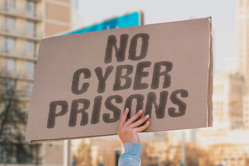"No Cyber Prisons" is shown on a protest banner calling for online freedom and digital rights. DEMOCRACY. RIGHTS. LIBERTY. PRIVACY. NETWORK. VOICES. UNITY.