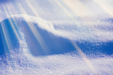 Background of fresh snow texture in blue tone. Snowfall texture background.