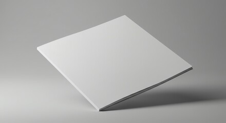 Minimalist white square book mockup floating on gray background studio shot