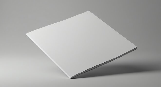 Minimalist white square book mockup floating on gray background studio shot