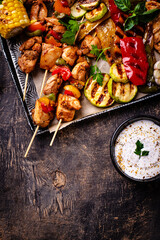 Assortment of grilled bbq meat and vegetables