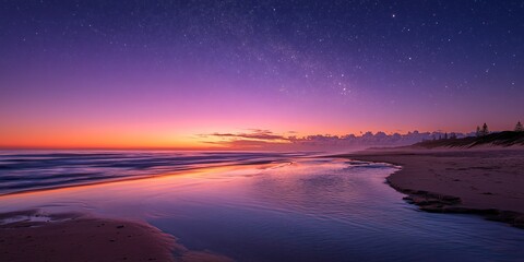 Fototapeta premium A serene beach at dusk, with a soft, purple and orange sky