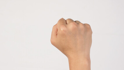 a hand forming a closed fist on white background.