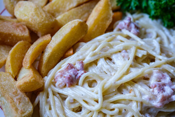  Italian Style Spaghetti Carbonara With Bacon Lrdons And Creamy Parmesan Sauce With Chips