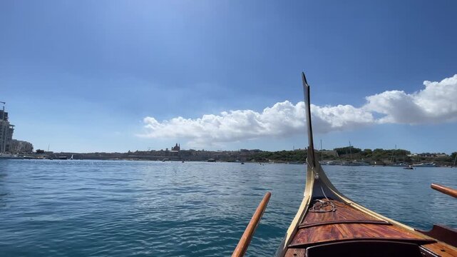 Riding the boat between Silema and Valetta overlooking cathedral