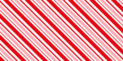 Candy cane Christmas background, peppermint diagonal stripes print seamless pattern
