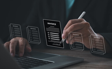 Hand writing on digital invoice document via virtual interface on laptop. Concept of online billing, financial technology, accounting system, electronic payment, and digital transaction.