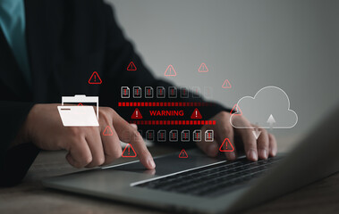 Cybersecurity concept showing businessman using laptop with warning alert icons, cloud data storage risks, and digital threats. Technology background for data protection, hacking, and IT security.