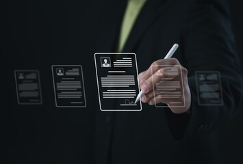 Business executive signing digital resume on virtual interface with stylus. Concept of recruitment, electronic contract, career profile, HR technology, and professional employment process.