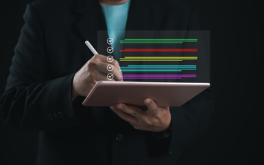 Entrepreneur completing digital checklist on tablet with colorful progress bars and stylus. Concept of productivity, task management, project tracking, and electronic workflow efficiency.