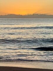 Obraz premium Beatiful sunset on beach of north island of new zealand