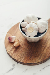 Garlic Cloves and Bulb in ceramic bowl
