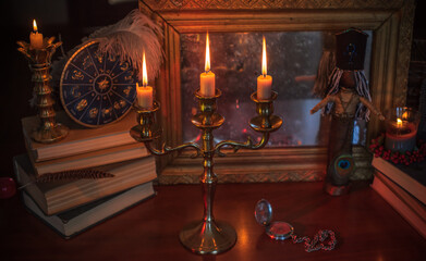 Magic doll for attracting love, rite with voodoo and fate creation, details on a table of witch,...