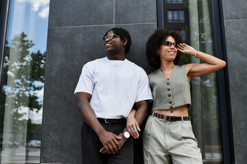 Stylish young couple enjoying a summer day together in an urban setting