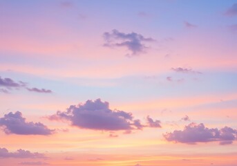 Fototapeta premium Pastel sunset sky with soft clouds creating a tranquil and dreamy scene