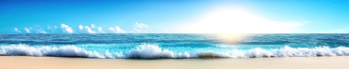 Obraz premium Tranquil Ocean Waves Gently Lapping at Golden Sand Under a Bright Blue Sky with Soft Clouds and a Radiant Sun on a Beautiful Summer Day