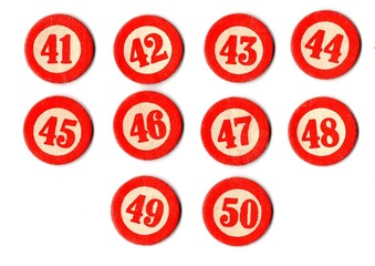 Vintage bingo or lotto counters isolated on a white background.