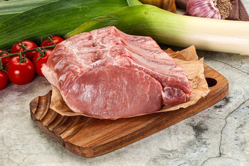 Raw pork loin cut with bone