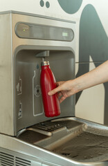 Water refill point for your bottle at the airport.