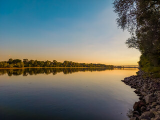 View of the bridge on the S7 route over the Vistula River during the golden hour.