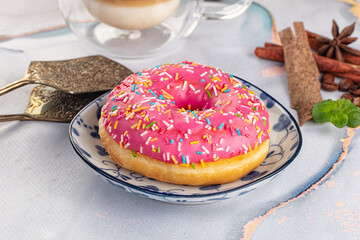 Sweet donut with strawberry icing