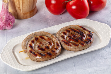 Grilled beef round circle sausages