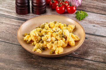 Scrambled egg omelet with green peas
