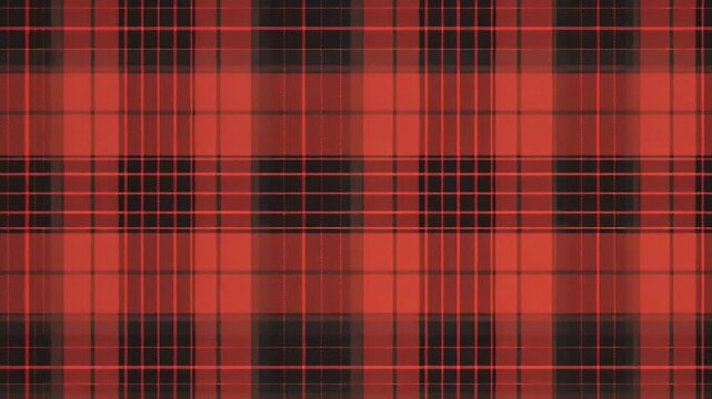 A close-up view of a red and black plaid fabric, suitable for craft or design projects