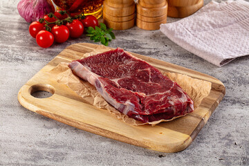 Gourmet raw rib eye steak