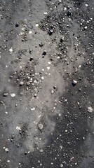Dark Volcanic Pebble Surface Texture