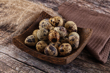 Raw brown quail egg heap