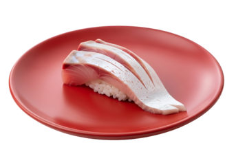 Freshly prepared sushi featuring vibrant slices of fish atop a bed of rice, presented on a bold red plate.