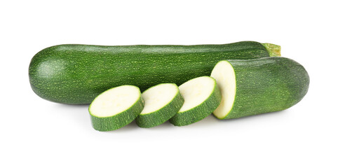 Whole and cut fresh zucchinis isolated on white