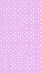 Pastel purple background with white polka dots