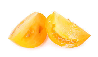 Pieces of ripe yellow tomato isolated on white