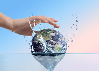 Save water concept. Woman dropping Earth into water against blue gradient background, closeup
