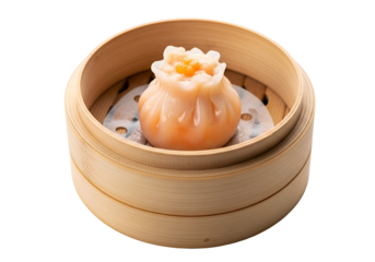 A single, delicate, steamed dumpling rests attractively in a light-brown bamboo steamer basket against a black backdrop.