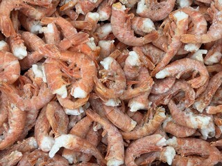Indulge in a Fresh Shrimp Pile that is Perfectly Crafted for Seafood Lovers Everywhere. A vibrant and tempting pile of fresh shrimp, just waiting to be transformed into delicious seafood dishes