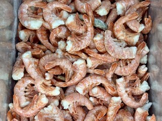 Indulge in a Fresh Shrimp Pile that is Perfectly Crafted for Seafood Lovers Everywhere. A vibrant and tempting pile of fresh shrimp, just waiting to be transformed into delicious seafood dishes