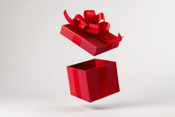 Open Red Gift Box with Ribbon on White Background