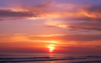Fototapeta premium Vibrant Sunset Over Calm Ocean Waves water
