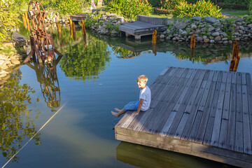 Happy european family, visting Hoi An city in Vietnam for a summer vacation, trying traditional food na watching the show in Memories Land