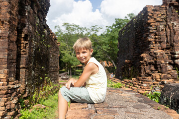 European family, visiting My Son Sanctuary, national heritage sightseeing in Vietnam, tourist...