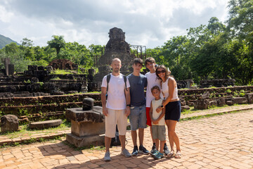 European family, visiting My Son Sanctuary, national heritage sightseeing in Vietnam, tourist...