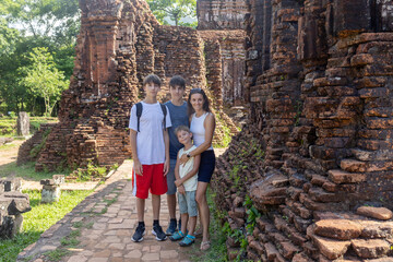 European family, visiting My Son Sanctuary, national heritage sightseeing in Vietnam, tourist...