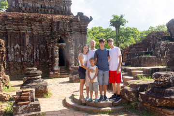 European family, visiting My Son Sanctuary, national heritage sightseeing in Vietnam, tourist...