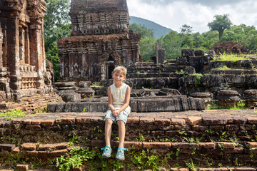 European family, visiting My Son Sanctuary, national heritage sightseeing in Vietnam, tourist...
