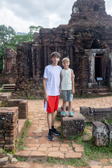 European family, visiting My Son Sanctuary, national heritage sightseeing in Vietnam, tourist...