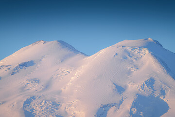 A panoramic view of the snow-capped peaks of Mount Elbrus, the highest point of the European...
