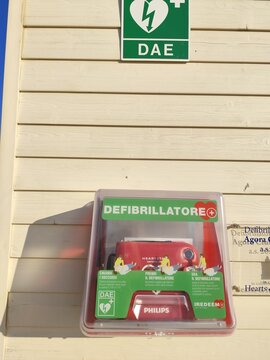 Defibrillator DAE Philips defibrillatore on wall street. Italy, Rimini - July 16, 2025